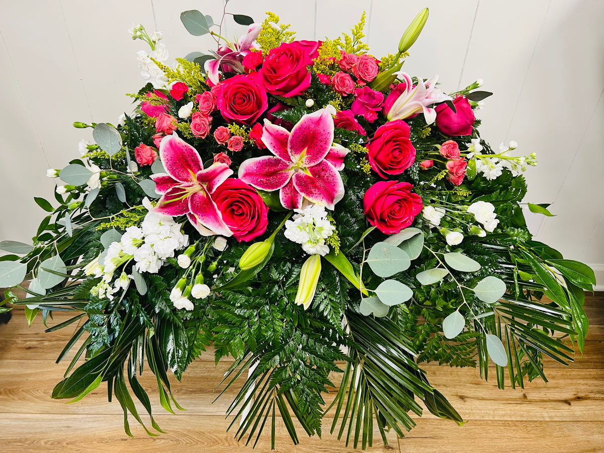 Two dozen roses arranged for delivery